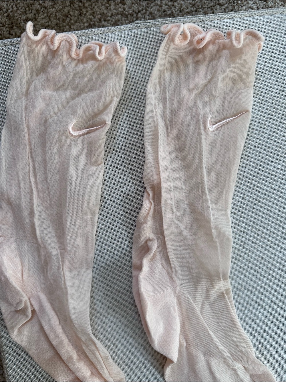 Nike woman’s Pale Pink Crew Socks with Swoosh